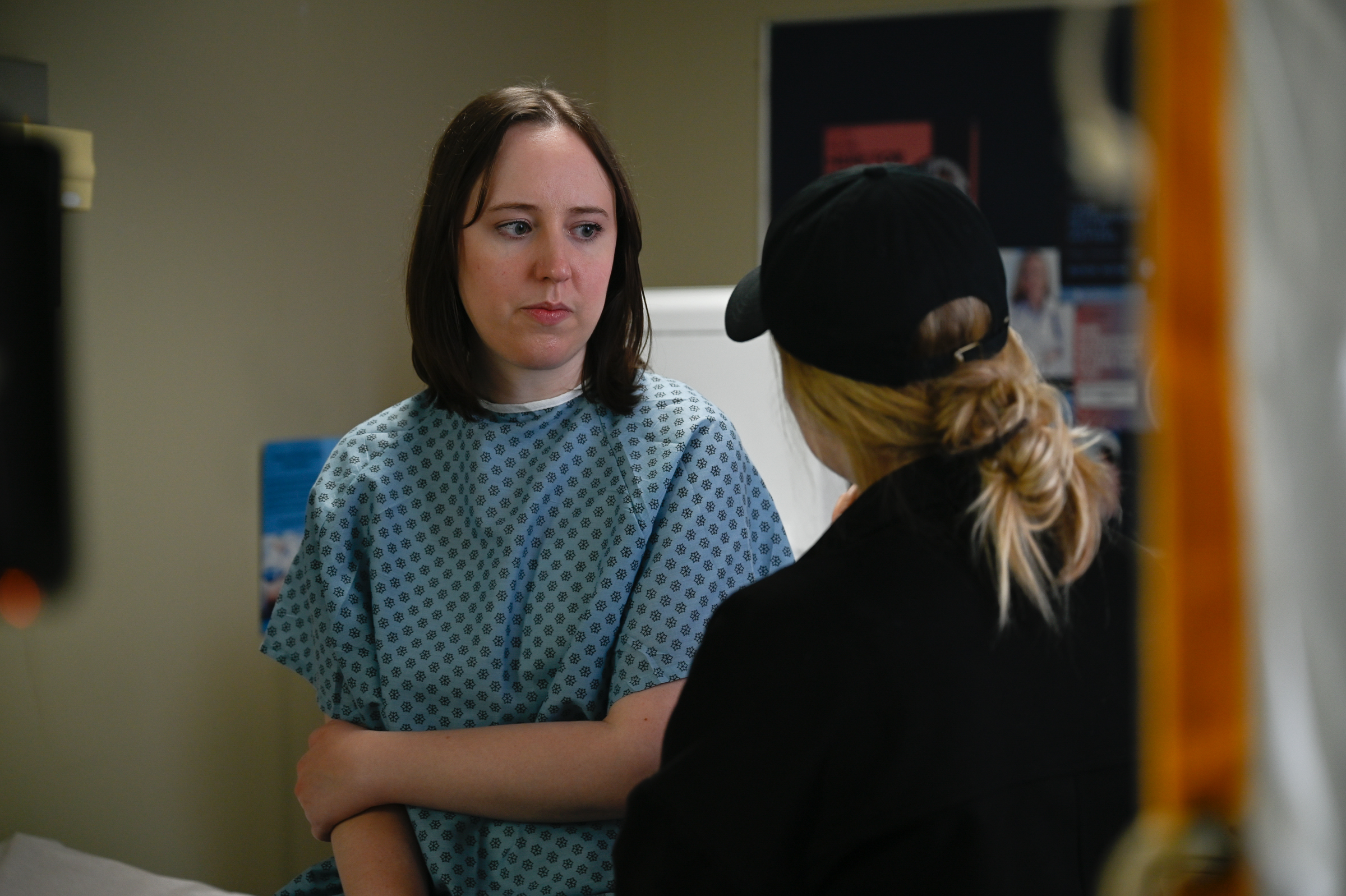 The Director (Vivien) is talking to Alice (Sarah).